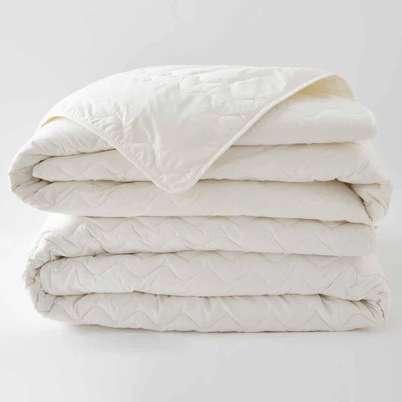 Pack Couette Bi-matière coton et laine bio 4 saisons Edelweiss + oreillers