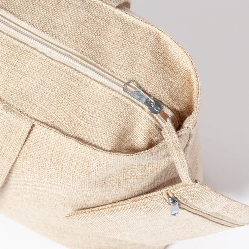 Sac original avec trousse de toilette assortie, en polyester résistant avec une finition naturelle DREXIS