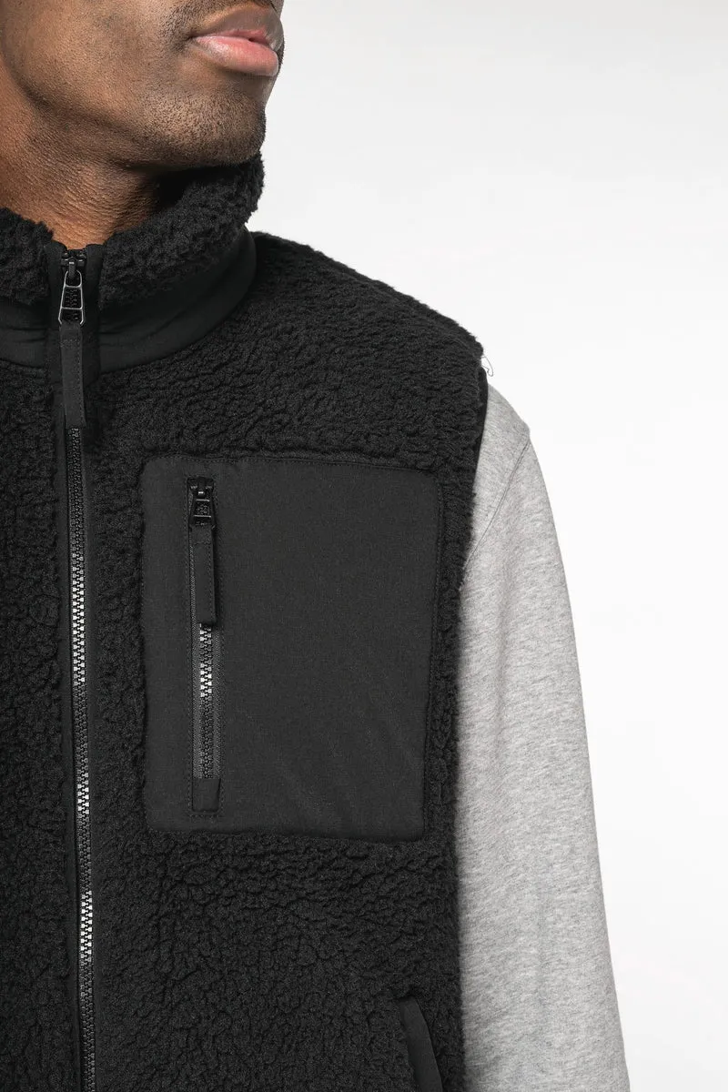 NS624 - Bodywarmer écoresponsable en sherpa unisexe
