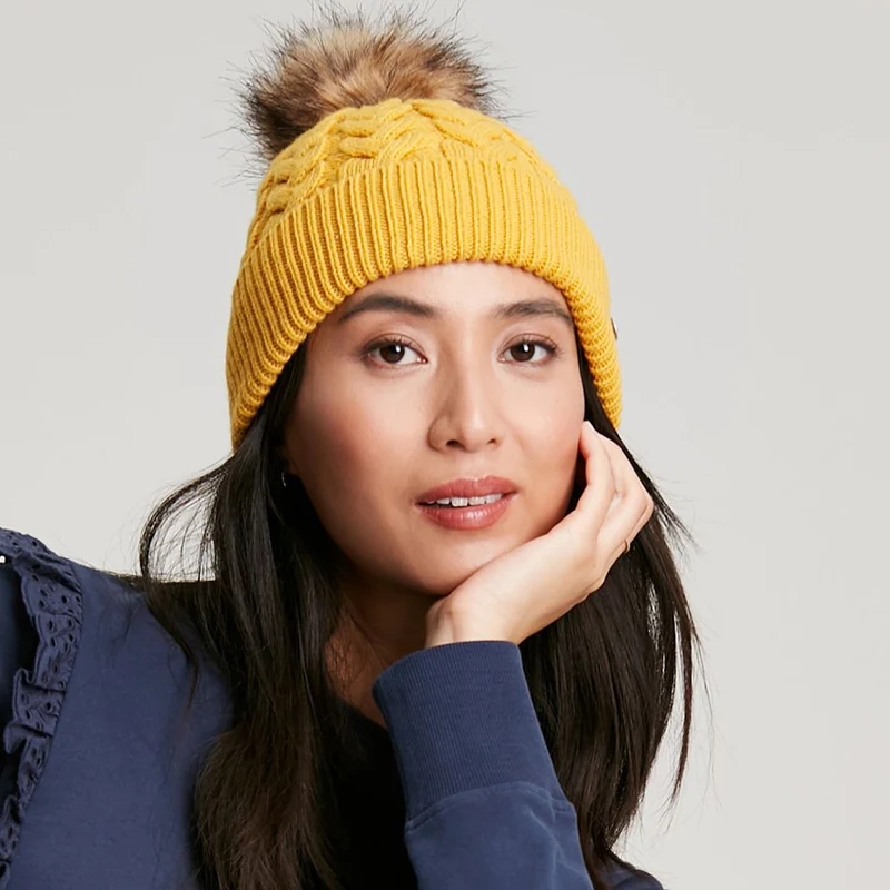 Bonnet à Pompon en Fausse Fourrure et Torsades Elena moutarde JOULES