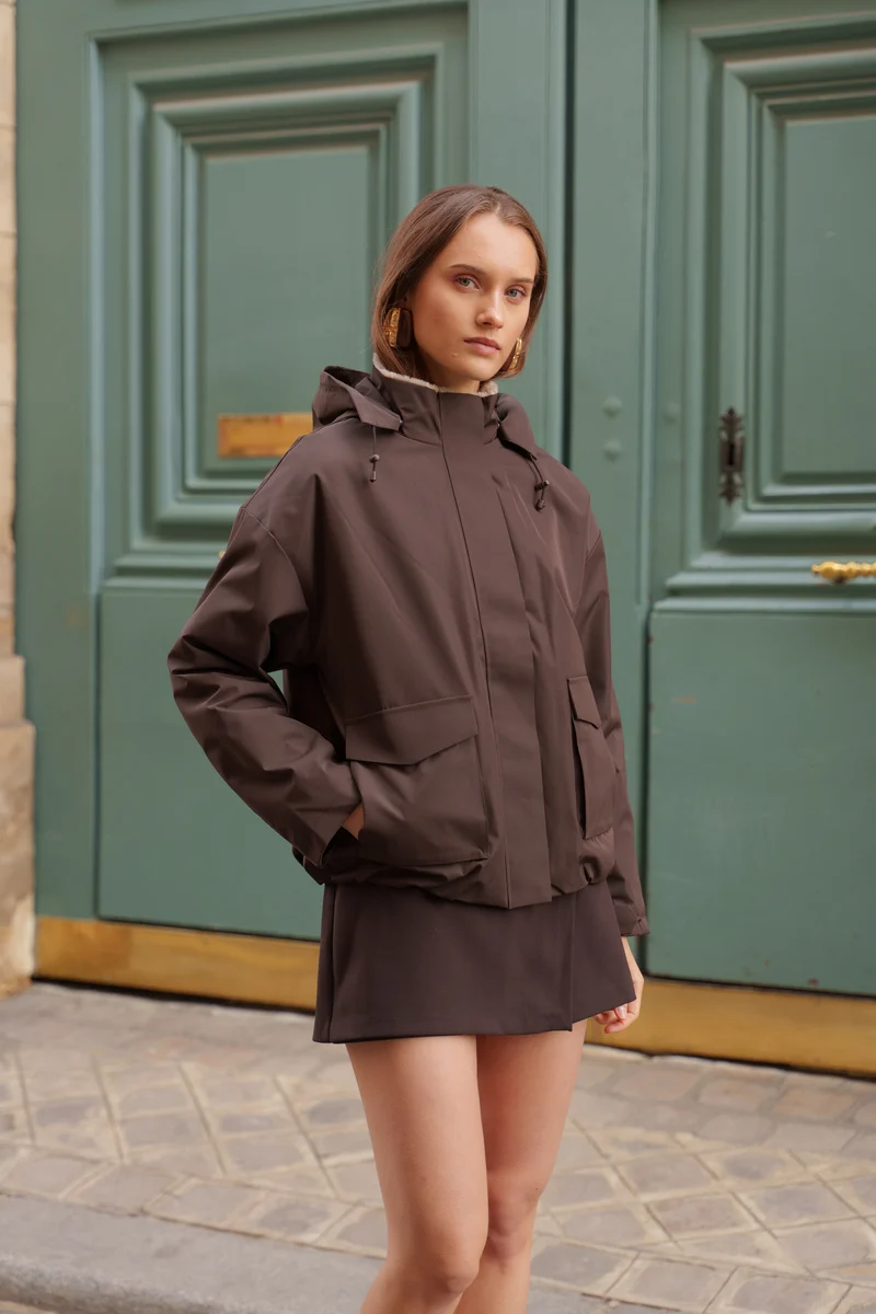 Veste imperméable fourrée à poches