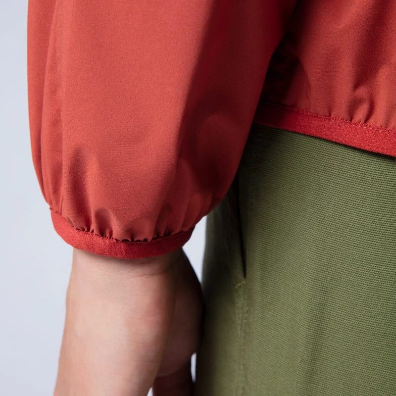 Windbreaker Imperméable en tissu technique orange abricot