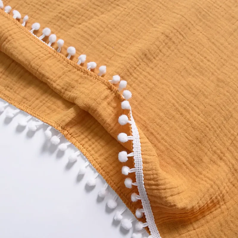 Poncho a capuche enfant